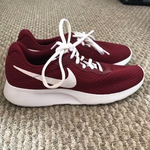 maroon athletic shoes